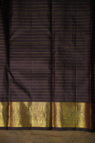 Dark brown fabric with gold border and stripes